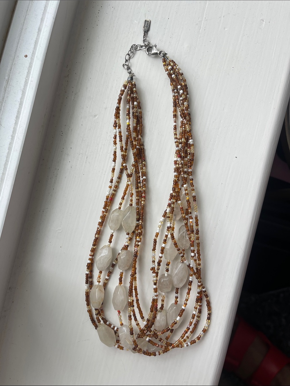 Multi-Strand Brown and White Beaded Necklace with Gemstone Accents